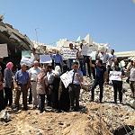 Shrine demolition halted by protest