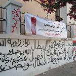 Protestors demonstrate against militiamen