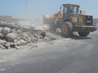 Locals start clearing Bab Al-Aziziya eyesore