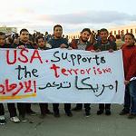 Benghazi demonstrators call for Hafter-led military council, burn US and British flags