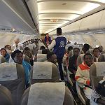 Fearful migrants crowd Guinea embassy after missed flight