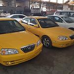 Tripoli starts to paint its taxis yellow
